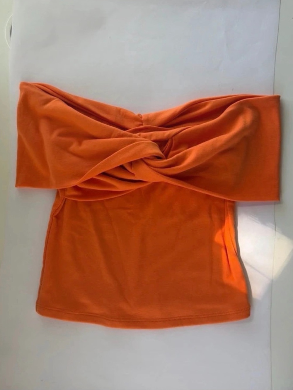 orange off-the-shoulder top